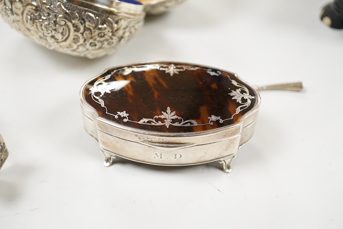 A George V engraved silver rectangular tea caddy, by Nathan & Hayes, Chester, 1913, 81mm, together with an Edwardian repousse silver mounted ring box by Nathan & Hayes, Chester, 1905, a Scottish silver and tortoiseshell